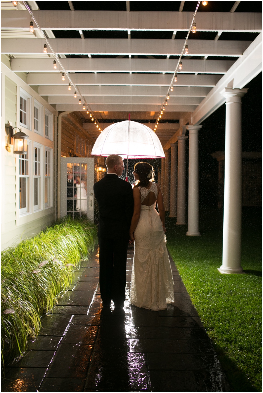 Chesapeake Bay Beach Club Wedding Photographer - Umbrella in the Rain Wedding Photograph