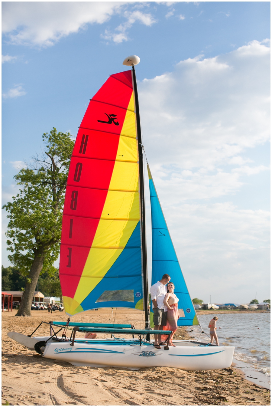 Buttonwood Beach Engagement Photographer - Catamaran love photo