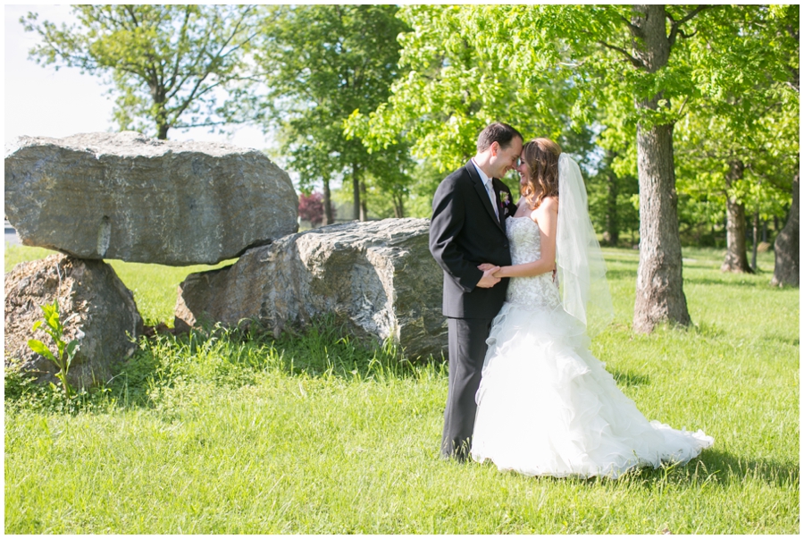 The Vineyards at Lost Creek Wedding Photographer - Vineyard rocks bride and groom