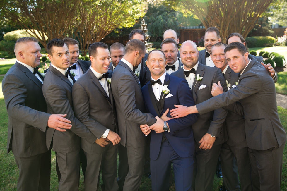 US Naval Academy Buchanan House gardens groomsmen - Jade and David Kircus 