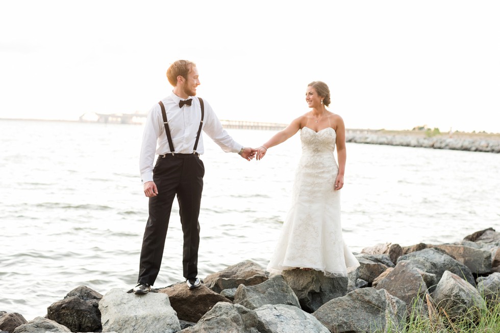 Couple on the rocks at sunset for a shore Wedding by Philadelphia wedding photographer