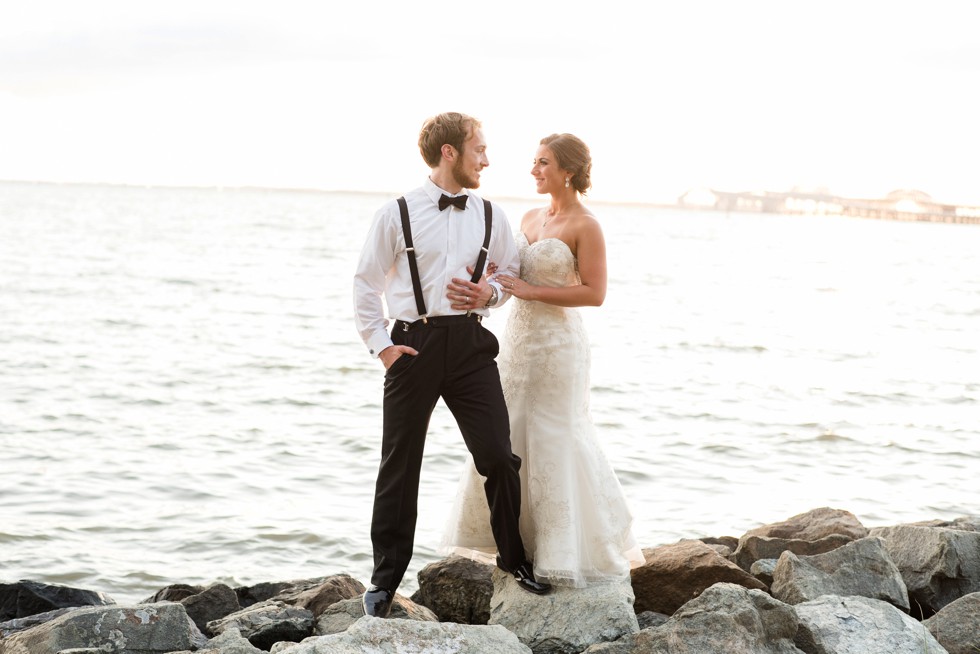 Couple on the rocks at sunset for a shore Wedding by Philadelphia wedding photographer