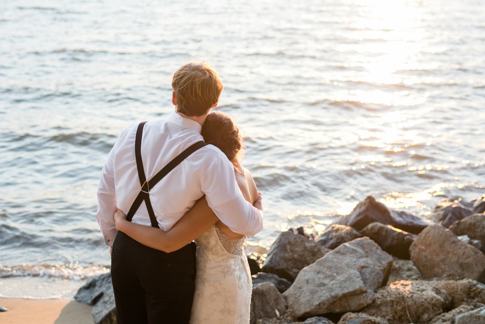 Wedding couple on the rocks at sunset - Philadelphia wedding photographer