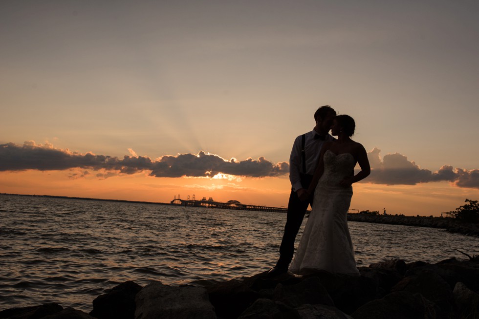 Wedding couple on the rocks at sunset - Philadelphia wedding photographer