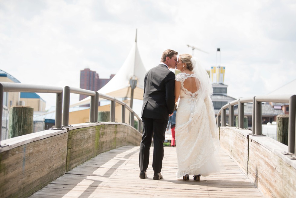 Wedding couple on the baltimore harbor at Fleet Street Bridge