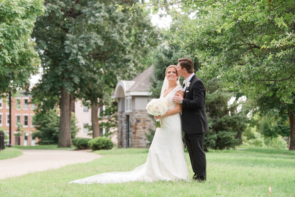 Bride and groom on federal Hill park for wedding photos, bride wearing a Kleinfeld's gown