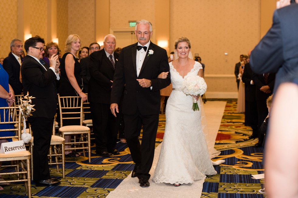 Bride walking down the aisle Indoor Wedding ceremony at Baltimore Waterfront Marriott