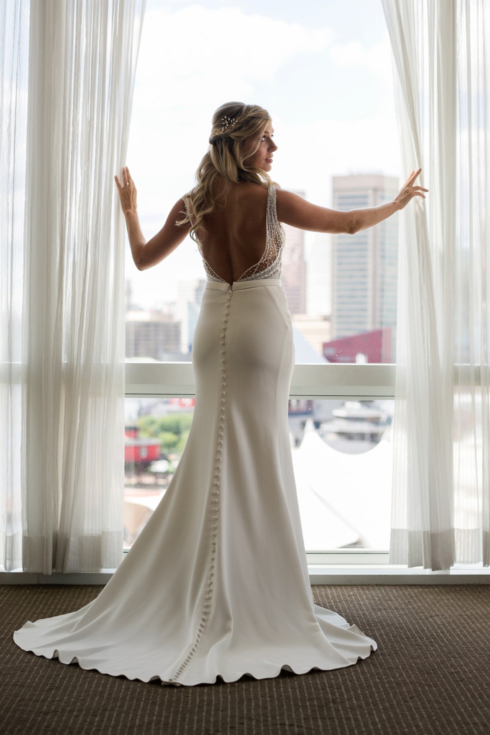 Four Seasons Hotel baltimore bride wearing a martina liana wedding dress