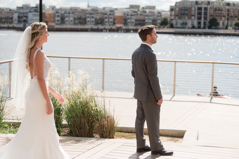 Four Seasons Hotel bride and groom first look bride wearing a martina liana dress