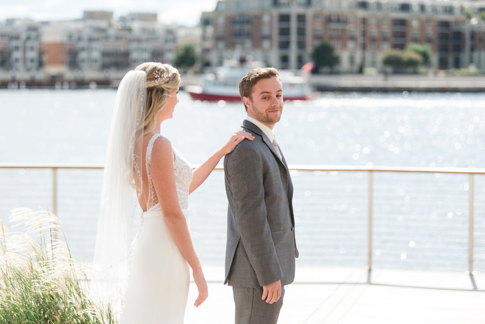 Four Seasons Hotel bride and groom first look bride wearing a martina liana dress, groom wearing a M. Stein & Company Tuxedo