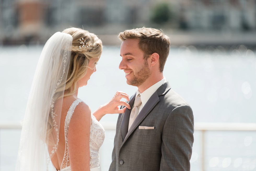 Four Seasons Hotel bride and groom first look bride wearing a martina liana dress, groom wearing a M. Stein & Company Tuxedo