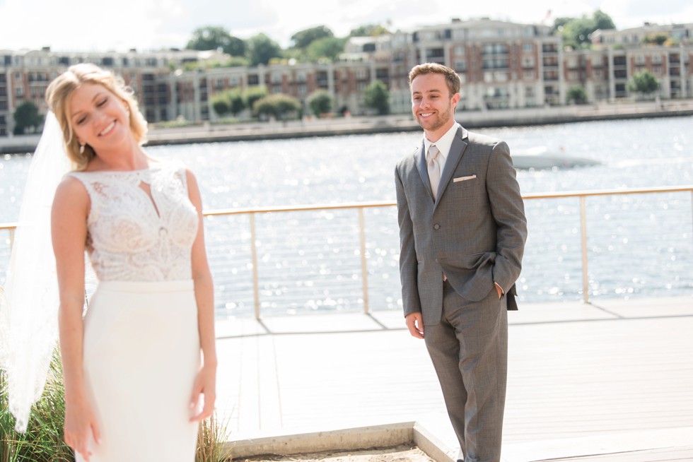 Four Seasons Hotel bride and groom first look bride wearing a martina liana dress, groom wearing a M. Stein & Company Tuxedo