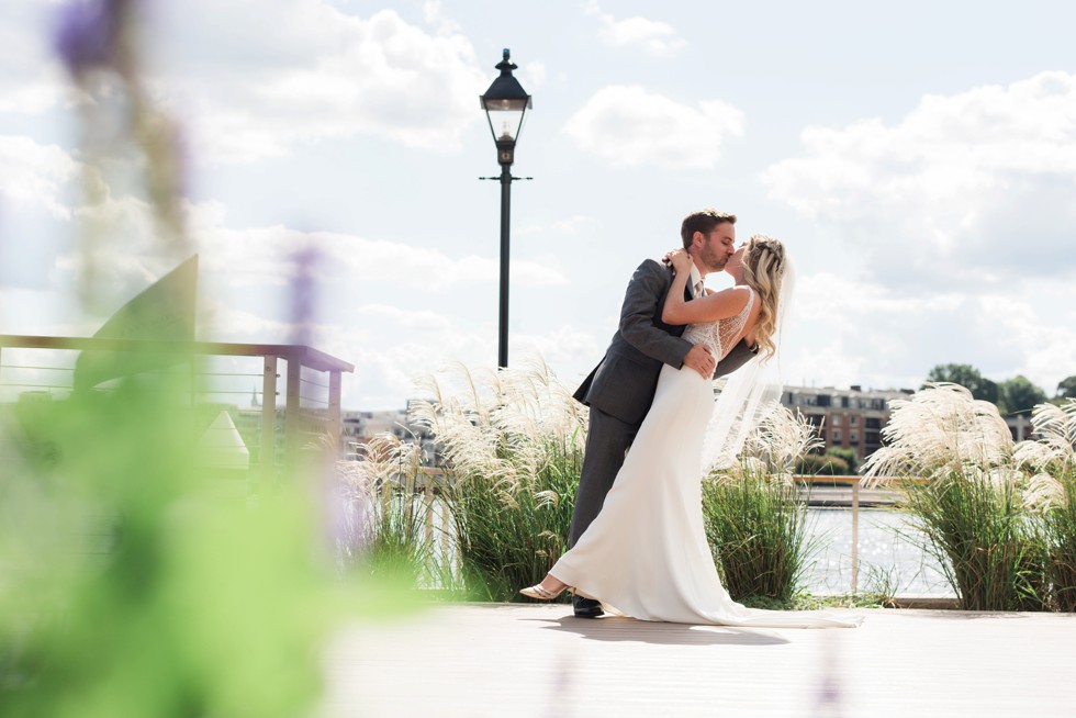 Four Seasons Hotel wedding photos in a martina liana bridal dress, groom wearing a M. Stein & Company Tuxedo