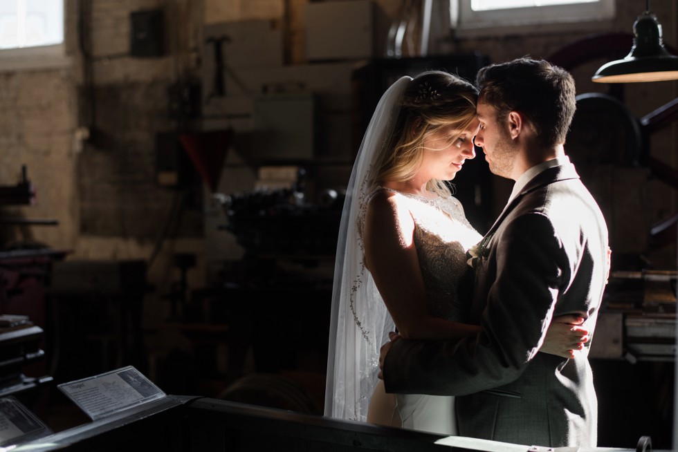 Newlyweds in the steel room at baltimore museum of Industry