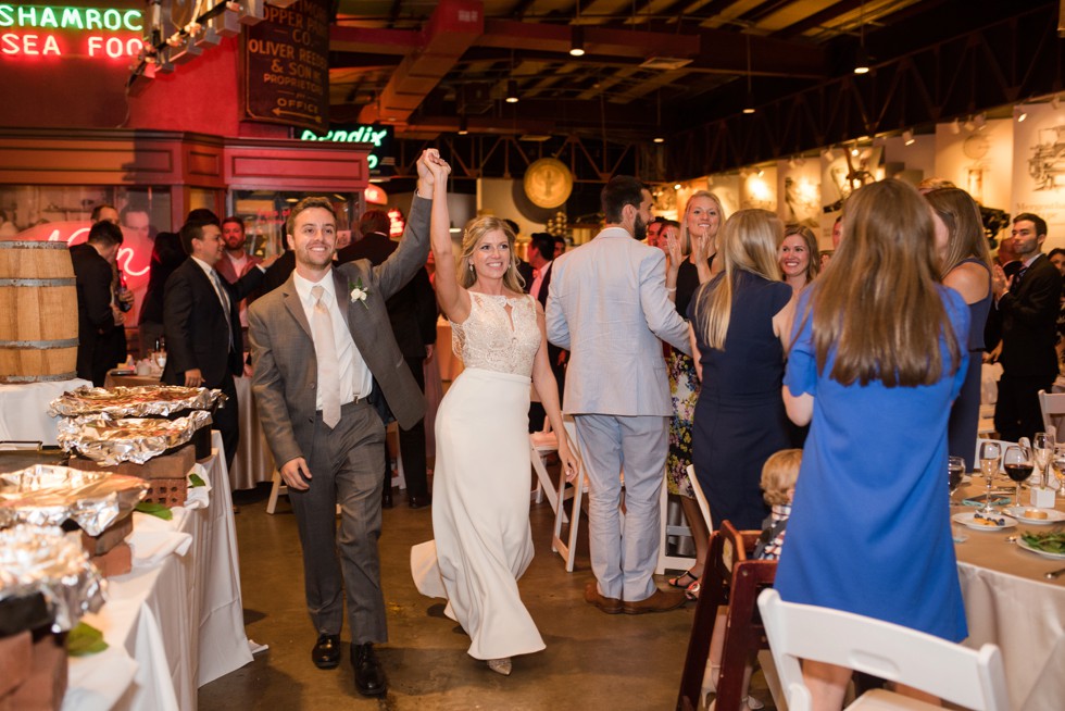 Bride and groom entrance into their reception at Baltimore Museum of industry