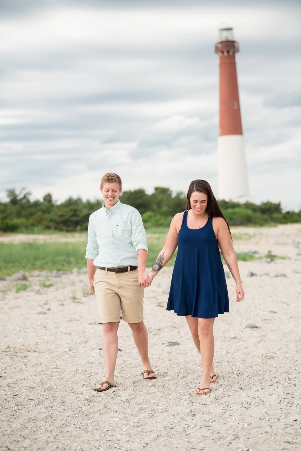 Two brides proposal photos on the Jersey Shore of Barnegat Lighthouse