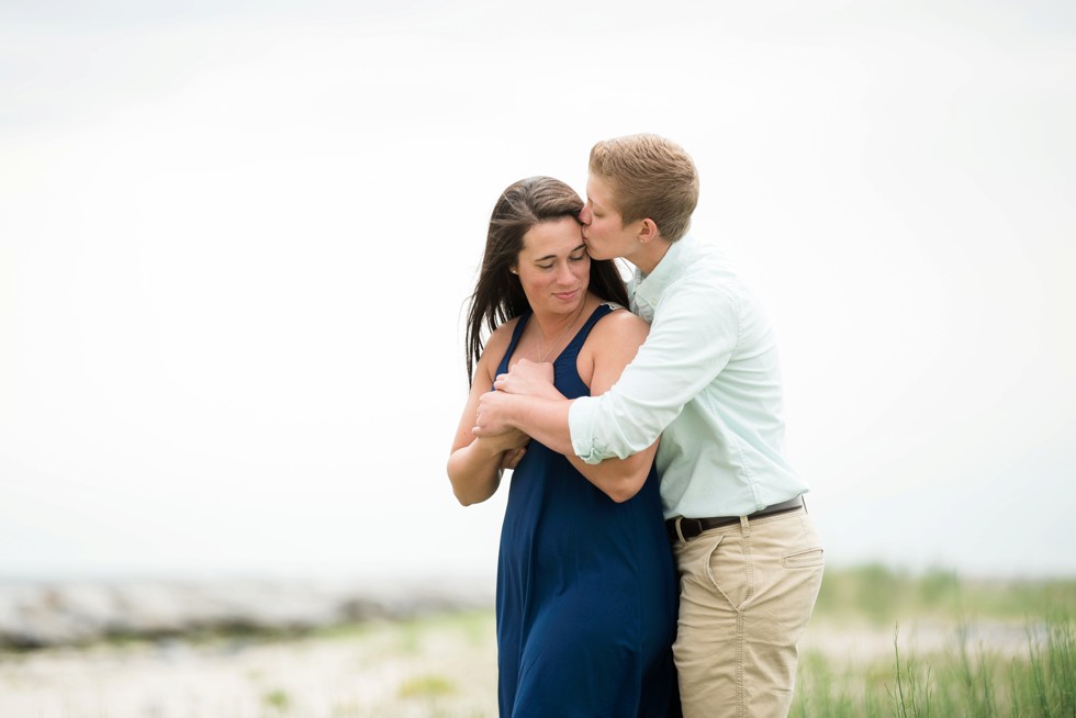 Engagement photos of two brides to be on the beach