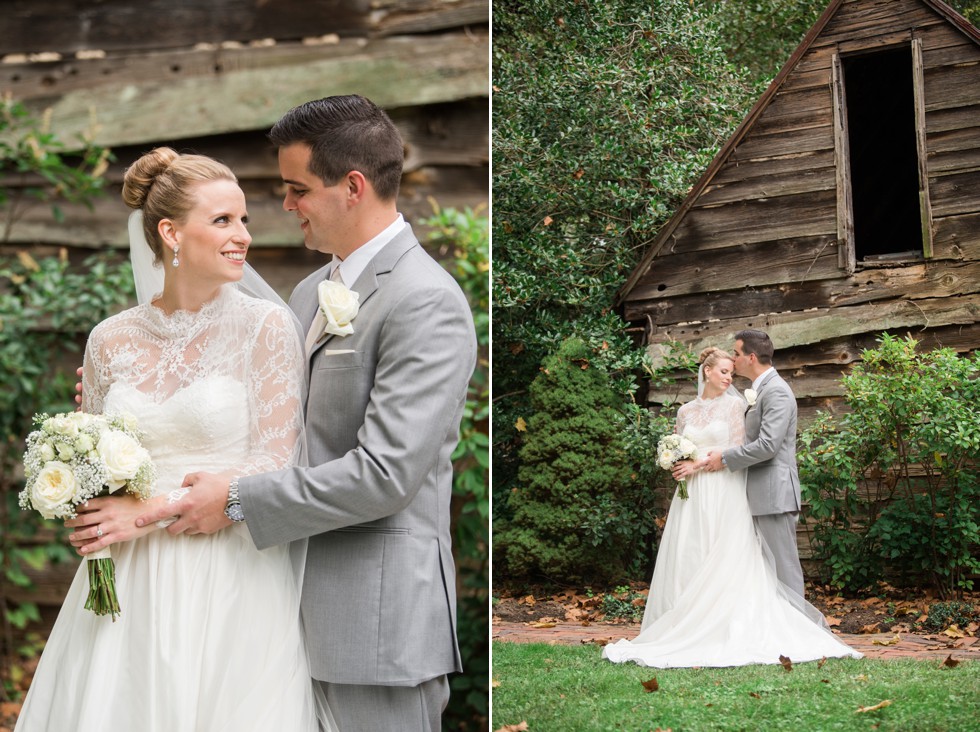 Bride and Groom kissing in front of the wood cabin at Elkridge Furance Inn