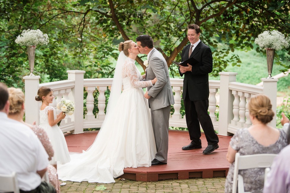 First Kiss as husband and wife in the Elkridge Furnace Inn garden