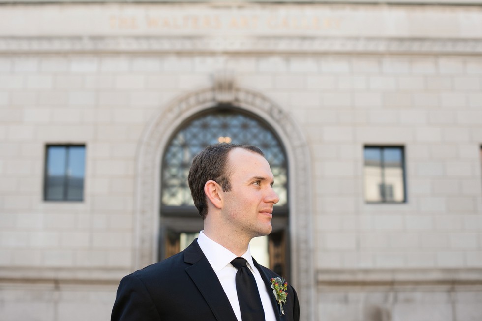 Groom waiting in front of Walters Art Museum in Baltimore before First Look