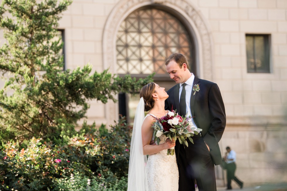 Newlywed photos in front of Walters Art Museum in Mount Vernon