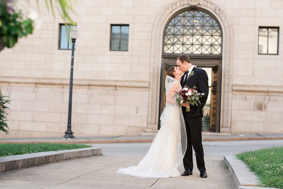 Newlywed photos in front of Walters Art Museum in Mount Vernon