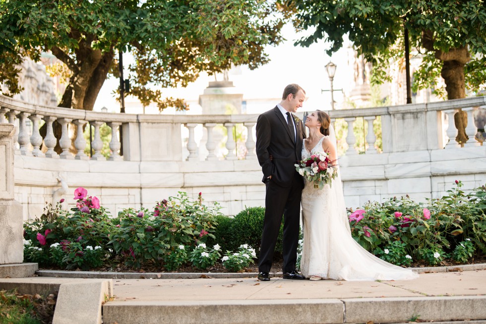 Mount Vernon Couple portraits with burgandy Wicked Willow Floral bouquet and Love Couture Bridal dress