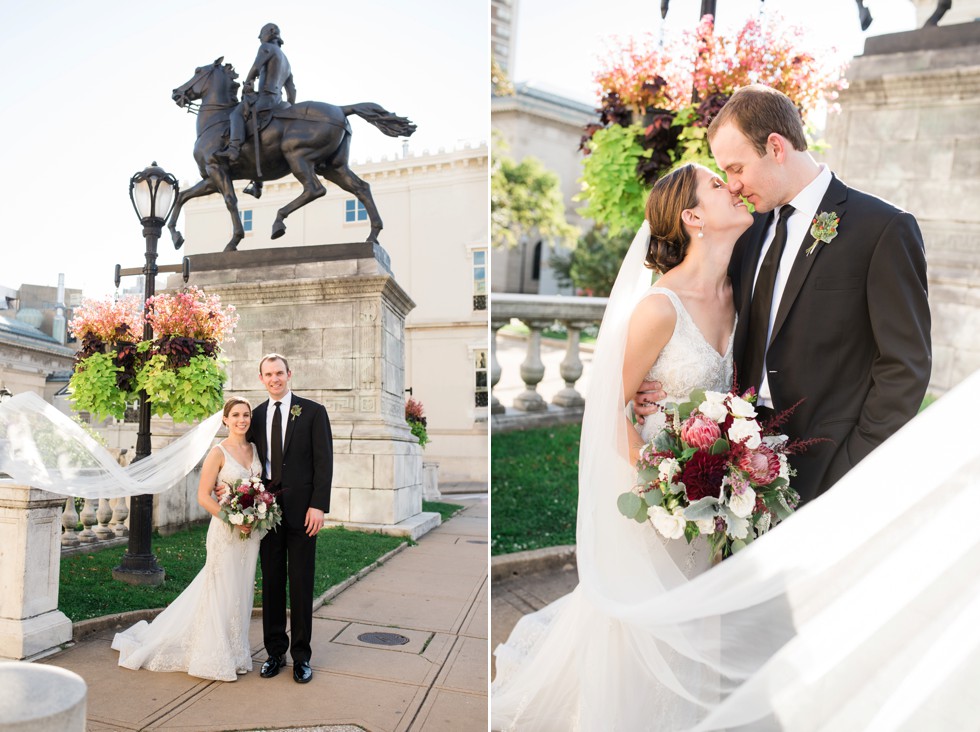 Cathedral veil blowing in the wind with Wicked WIllow Floral bouquet and black tux