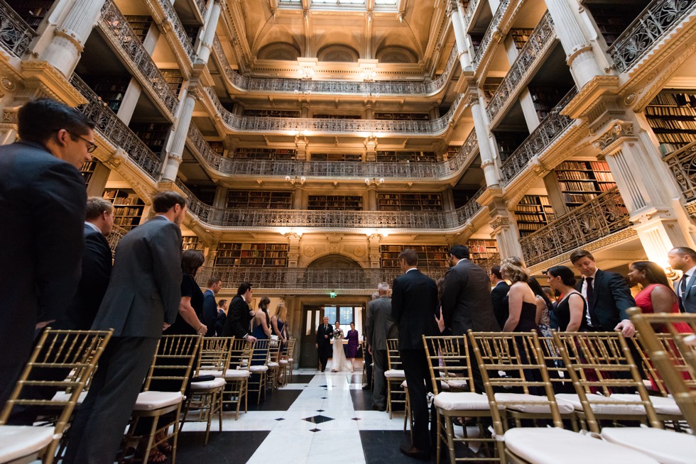 Bride walking down the aisle at peabody library ceremony