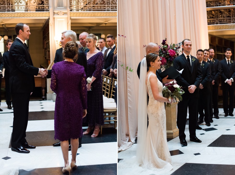 Parents walking the bride down the aisle at peabody library ceremony