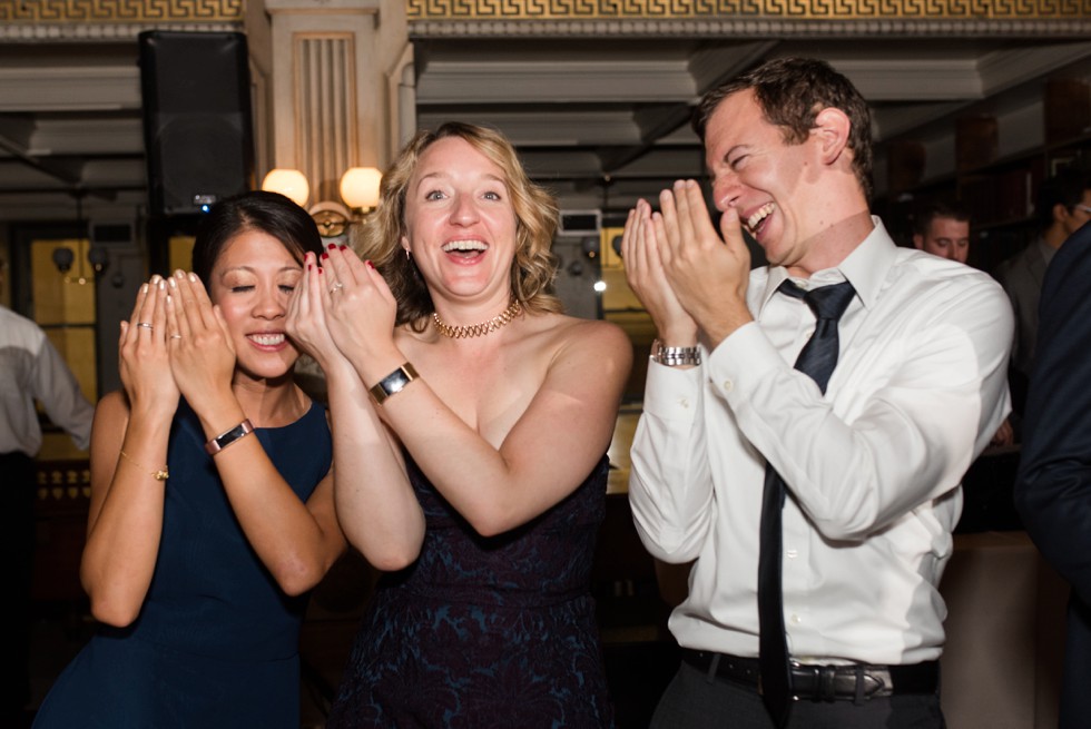 Fun dancing photos at a library reception