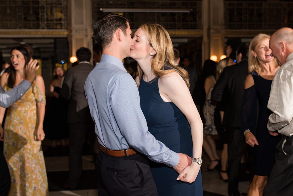 Kissing on the dance floor at the Peabody Library in Mount Vernon in a blue dress