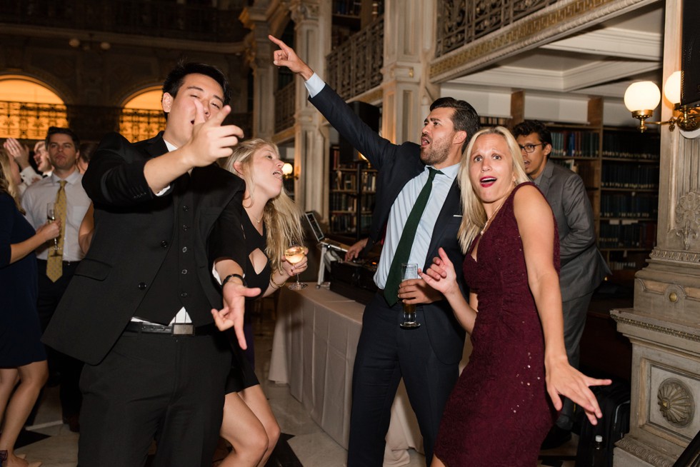 Fun dancing photos at a library reception