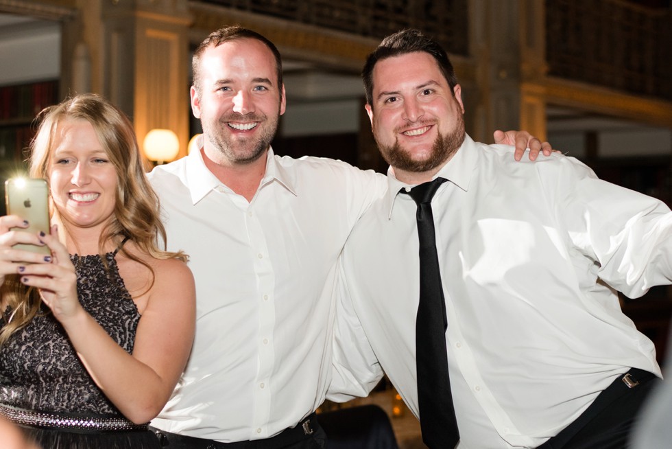 Fun dancing photos at a library reception