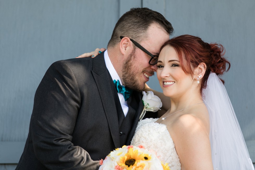 bride and groom portraits with a teal bowtie at Anchor Inn Wedding