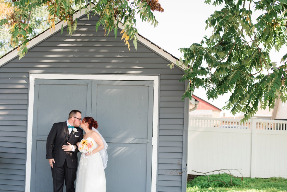 bride and groom portraits with a teal bowtie at Anchor Inn Wedding