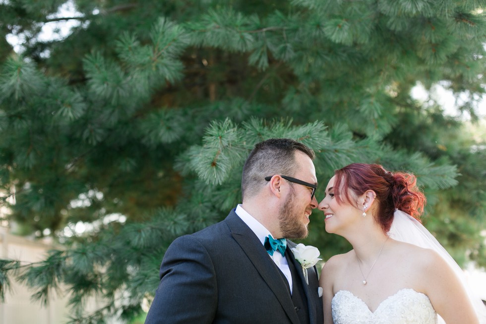 bride and groom portraits with a teal bowtie at Anchor Inn Wedding