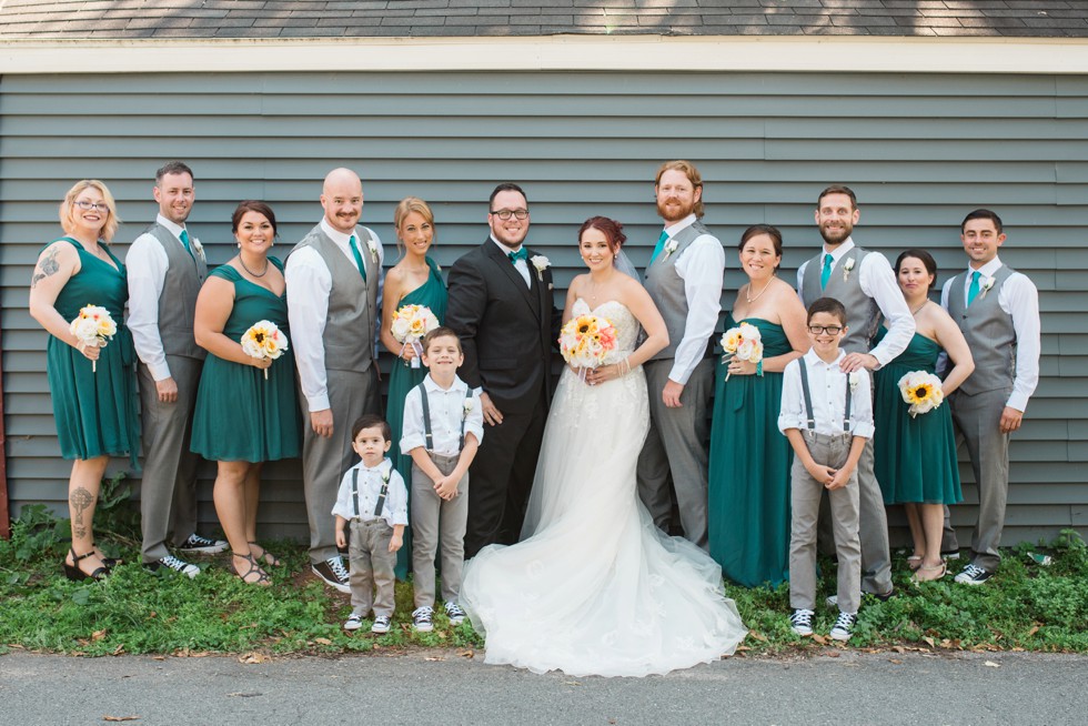 Groomsmen in grey vests and converse sneakers at Anchor inn Wedding in September