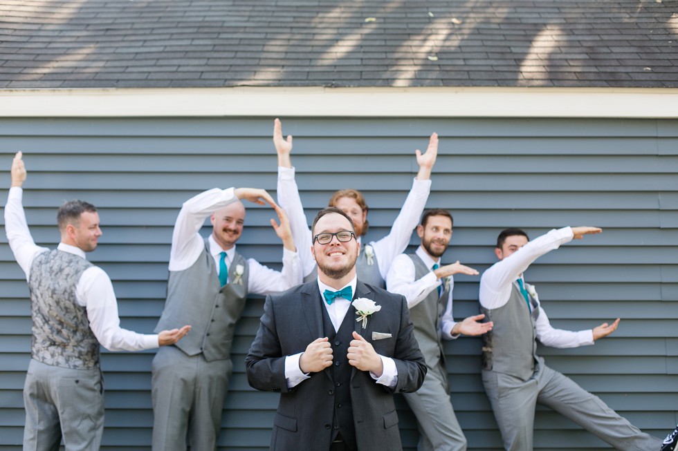 Groomsmen in grey vests and converse sneakers at Anchor inn Wedding in September