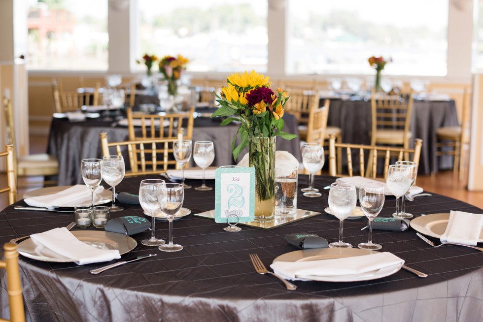 Wedding reception details with sunflowers at Anchor Inn on the waterfront