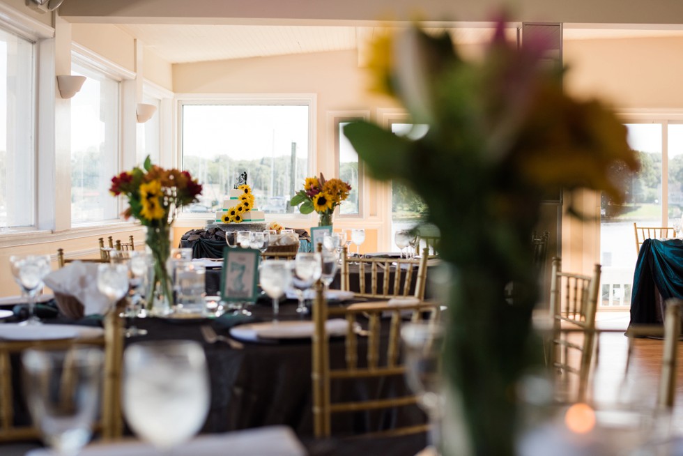 Wedding reception details with sunflowers at Anchor Inn on the waterfront