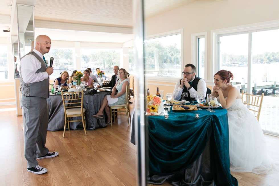 Toasts at waterfront wedding venue at Anchor Inn