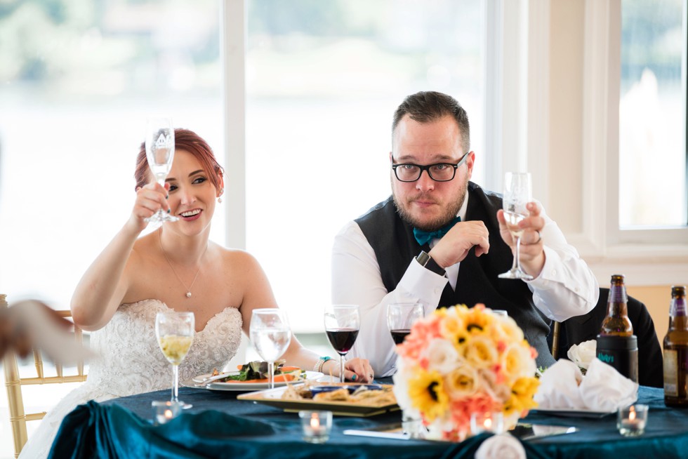 Toasts at waterfront wedding venue at Anchor Inn