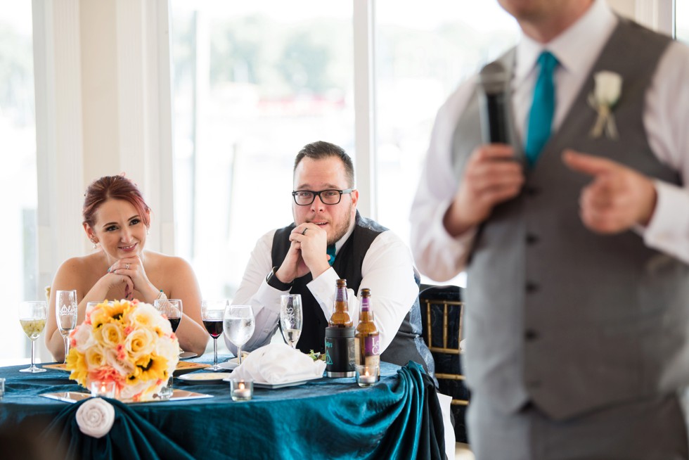 Toasts at waterfront wedding venue at Anchor Inn