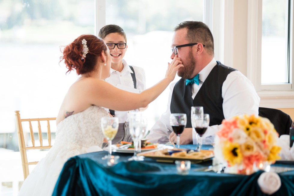 Toasts at waterfront wedding venue at Anchor Inn