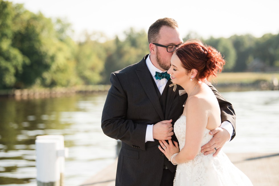 Bride and groom wedding portraits on the docks at Anchor Inn