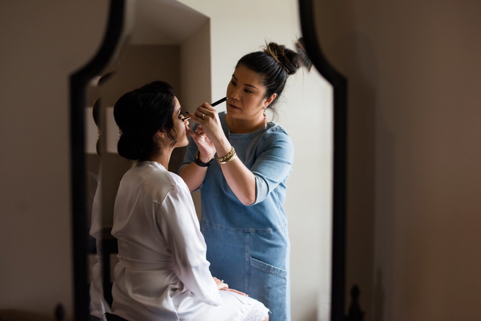 Bride getting ready and Valerie Hammer Makeup Artistry