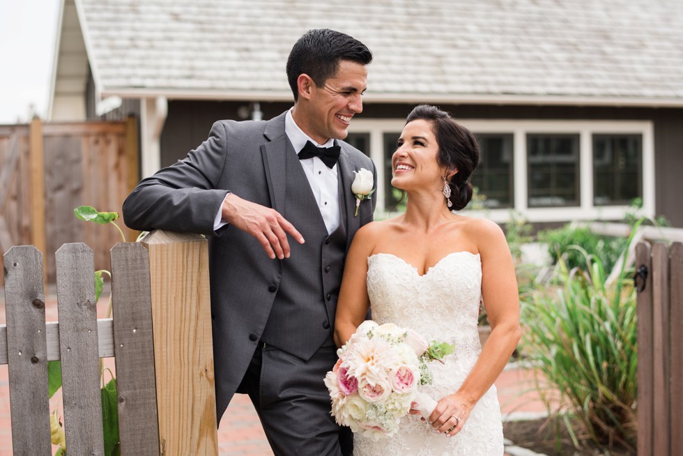 Couple laughing in the Gardens at The Inn at the Chesapeake Bay Beach Club