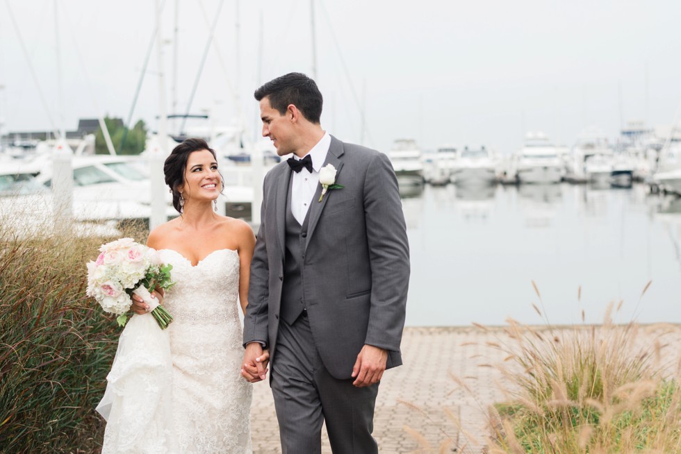 Waterfront Wedding portraits of Bride and groom overlooking the docks in Stevensville