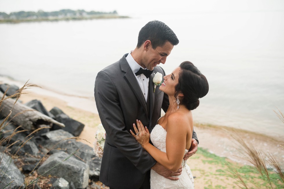 Chesapeake Bay bridge in the background of wedding portraits on the Beach